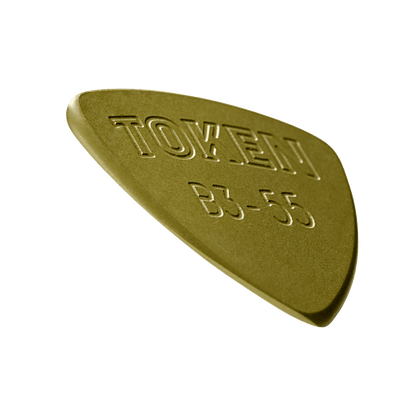 Token B3-55 Small Triangle guitar pick in Green Torlon, angled view showing precision bevel