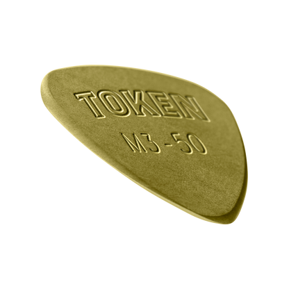 Token M3-50 Large Semi-Round guitar pick in Green Torlon, angled view showing precision bevel