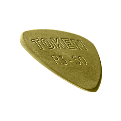 Token R3-50 Small Semi-Round guitar pick in Green Torlon, angled view showing precision bevel